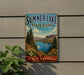 A vintage-style metal sign for Summer Lake State Park in New Mexico, featuring a scenic landscape with a lake, mountains, and a sailboat.