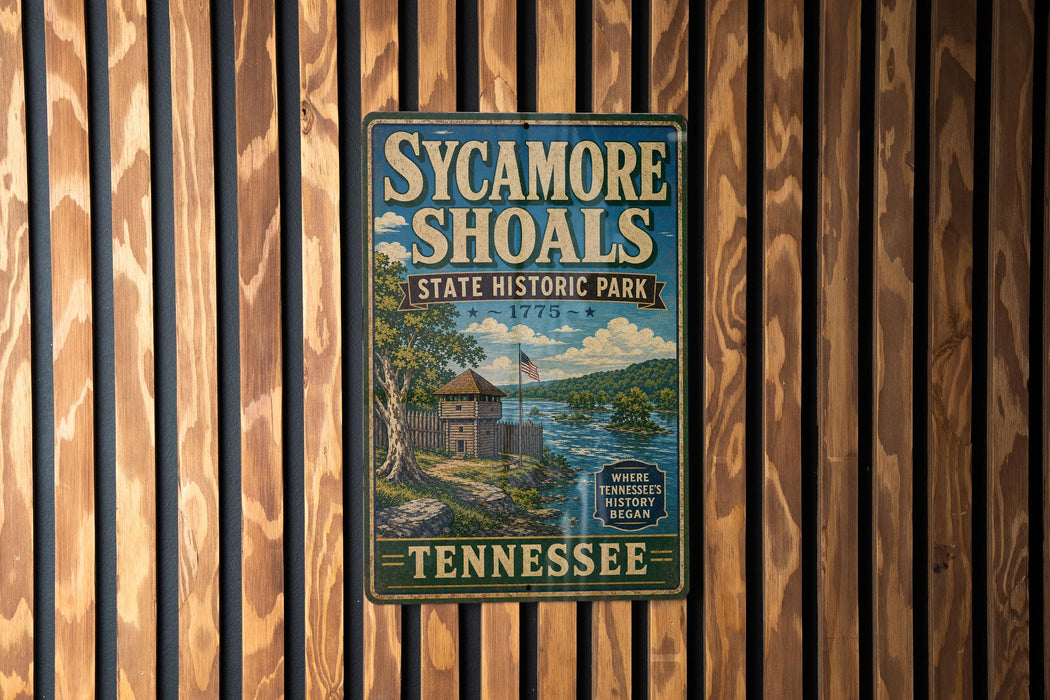 A vintage-style metal sign for Sycamore Shoals State Historic Park in Tennessee, featuring a scenic illustration of a lake and a historic building.