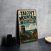 A vintage metal sign for Talcott Mountain State Park in Connecticut, featuring a scenic illustration of a lookout tower overlooking a valley with a river.