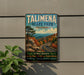 A vintage metal sign for Talimena State Park in Oklahoma, featuring a scenic mountain landscape with winding roads and autumn foliage.