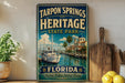 A vintage-style sign for Tarpon Springs Heritage State Park in Florida, featuring a boat and palm trees, is displayed on a shelf next to a wooden cutting board and some lemons.