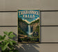 A vintage-style metal sign for Taughannock Falls State Park, featuring a waterfall and lush greenery, is displayed on a wall.