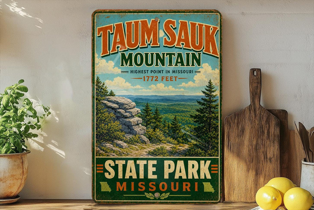 A vintage-style sign for Taun sauk Mountain, the highest point in Missouri, with a scenic mountain landscape and pine trees.