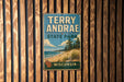 A vintage-style metal sign for Terry Andrea State Park in Wisconsin, featuring a scenic landscape with a beach, mountains, and trees.