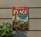 a vintage-style sign for Heritage Park in Utah, with a wagon and a monument depicted on the sign.
