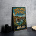 A vintage-style sign for Thousand Springs State Park in Idaho, featuring a scenic illustration of a waterfall and a desert landscape.