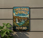 A vintage-style sign for Thousand Springs State Park in Idaho, featuring a scenic landscape with waterfalls and mountains.