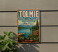 A vintage-style metal sign for Tolmie State Park in Washington, featuring a scenic mountain landscape with a lake and dock.