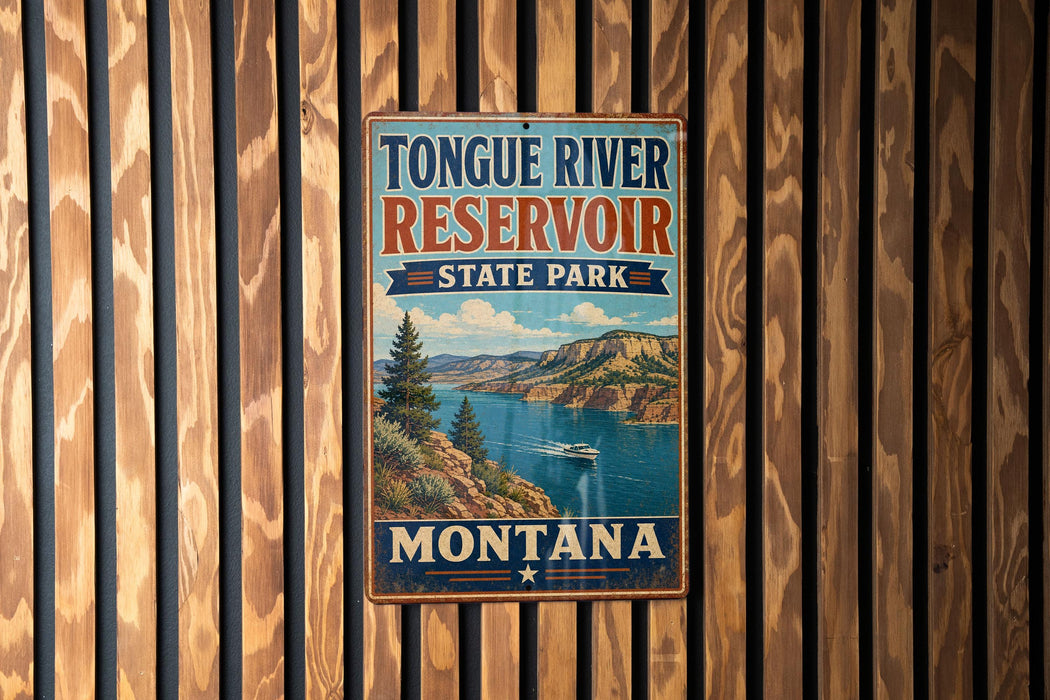 A vintage metal sign for Tongue River Reservoir State Park in Montana, featuring a scenic landscape with a river, mountains, and a boat.