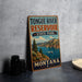 A vintage-style sign for Tongue River Reservoir State Park in Montana, featuring a scenic landscape with mountains, water, and a boat.