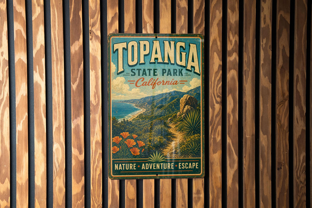 A vintage-style metal sign for Topanga State Park in California, featuring a scenic landscape with mountains, palm trees, and a beach.