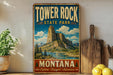 A vintage-style metal sign for Tower Rock State Park in Montana, featuring a scenic mountain landscape with a river and pine trees.
