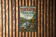A vintage-style sign for Townshend State Park in Vermont, featuring a scenic illustration of the park's natural surroundings.