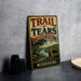 A vintage-style metal sign for Trail of Tears State Park in Missouri, featuring a scenic illustration of a person and horse on a trail.