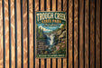 A vintage metal sign for the Tough Creek State Park in Pennsylvania, featuring a waterfall and lush greenery, is displayed on a wooden wall.