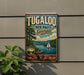 A vintage-style metal sign for Tugaloo State Park in Georgia, featuring a scenic image of a lake with a sailboat and mountains in the background.