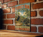 A vintage-style metal sign for Turkey Run State Park in Indiana, featuring a scenic landscape with a river and waterfall.