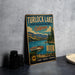 A vintage metal sign for Turlock Lake, California, featuring a scenic illustration of the lake and mountains.