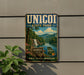 A vintage-style metal sign for Unicoi State Park, featuring a scenic landscape with a waterfall and mountains.