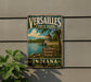 A vintage-style sign for Versailles State Park, featuring a scenic image of a lake and a building, with the text "Verailles State Park" and "Indiana" prominently displayed.