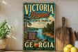 A vintage-style sign for Victoria Bryant State Park in Georgia, featuring a scenic illustration of the park's natural surroundings.