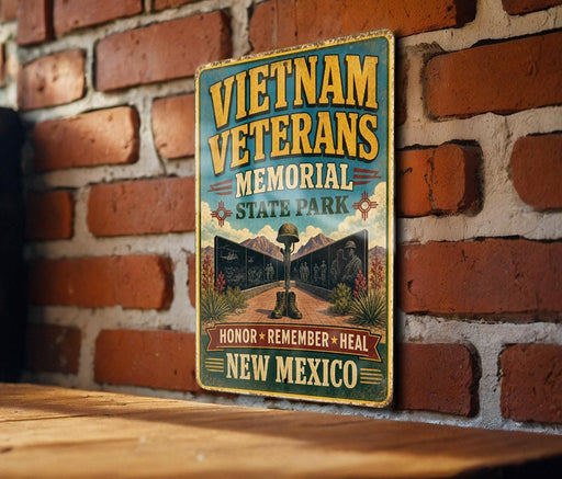 a sign for Vietnam Veterans Memorial in New Mexico, mounted on a brick wall.
