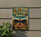a sign for the Vietnam Veterans Memorial in New Mexico, with a vintage-style design and text that reads "Vietnam Veterans Memorial State Park" and "Honor, Remember, Heal New Mexico".