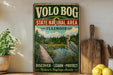 a vintage-style metal sign for the State Natural Area in Illinois, with a scenic illustration of a wooden boardwalk leading to a pond with a bird. The sign also includes the words "Discover, Learn, Protect Nature's Heritage Awaits".