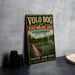 A vintage-style metal sign for the State Natural Area in Illinois, featuring a scenic illustration of a bird and a wooden walkway over a pond.