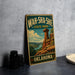 A vintage-style metal sign for Wah-Sha-She State Park in Oklahoma, featuring a scenic landscape with a rock formation and a river.
