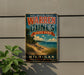 A vintage-style sign for Warren Dunes State Park in Michigan, featuring a scenic beach landscape with sand dunes and a body of water.