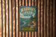 A vintage metal sign for Warrior's Path State Park in Pennsylvania, featuring a scenic mountain landscape.