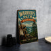 A vintage-style metal sign for Warrior's Path State Park in Tennessee, featuring a scenic mountain landscape with a Native American headdress and the text "HIKE THE LEGEND EST. 1975".
