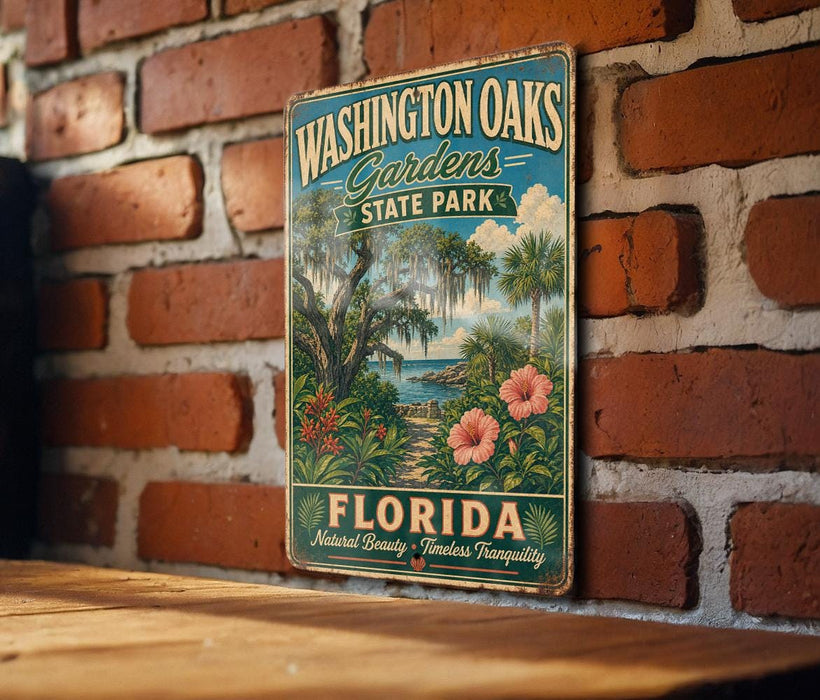 A vintage-style metal sign for Washington Oaks Gardens State Park in Florida, featuring a tropical landscape with palm trees, flowers, and a body of water.