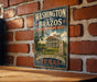 A vintage-style metal sign with the text "WASHINGTON on the BRAZOS" and "State Historic Site" is displayed on a brick wall.