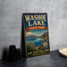 A vintage-style metal sign for Washoe Lake State Park, Nevada, featuring a scenic landscape with mountains, a lake, and text promoting the park's attractions.