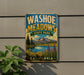 A vintage-style metal sign for Washoe Meadows State Park in California, featuring a scenic landscape with mountains, a lake, and wildflowers.