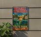 A vintage-style sign for Weeki Wachee Springs, featuring a mermaid and the text "Weeki Wachee Springs State Park, Florida".