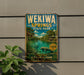 A vintage-style metal sign for Wekia Springs State Park, featuring a scenic image of the park's natural beauty and inviting visitors to experience the Old Florida Charm.