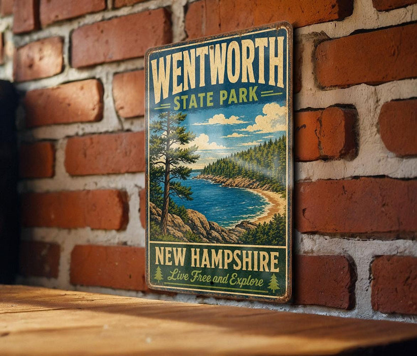 A vintage metal sign for Wentworth State Park in New Hampshire, featuring a scenic landscape with a lake, mountains, and pine trees.