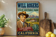 A vintage-style poster of Will Rogers, the famous American actor, is displayed on a wall, with a wooden cutting board and a potted plant in the foreground.