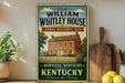 a vintage-style sign for the William Whitley House State Historic Site in Danville, Kentucky, with a wooden cutting board and a potted plant in the foreground.