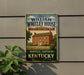 A vintage-style metal sign for the William Whitley House State Historic Site in Danville, Kentucky, with a brick house and trees in the background.