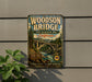 A vintage-style metal sign for the Woodson Bridge, a state recreation area in California, featuring a scenic illustration of the bridge and surrounding landscape.