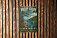 A vintage-style sign for Wolly Hollow State Park in Arkansas, featuring a scenic landscape with a lake, mountains, and a sailboat.