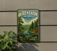 A vintage-style metal sign for Wrentham State Forest, featuring a scenic landscape with pine trees, a river, and mountains.