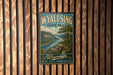 A vintage-style metal sign for Wyalusing State Park in Wisconsin, featuring a scenic landscape with a river and mountains.