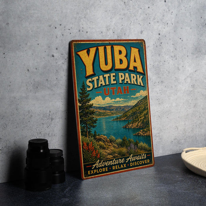 A vintage-style sign for Yuba State Park in Utah, featuring a scenic landscape with mountains, water, and pine trees.
