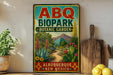 a vintage-style metal sign for the Abq Biopark Botanic Garden in Albuquerque, New Mexico, with a desert landscape and cacti on display.