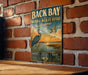 A vintage-style metal sign for the National Wildlife Refuge in Virginia, featuring an illustration of a heron and ducks in a natural setting.